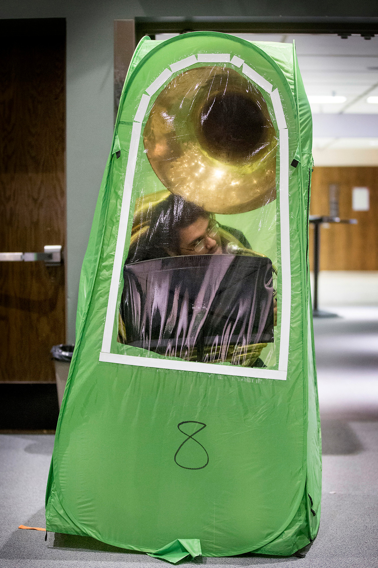 Close-up of student in band tent pod